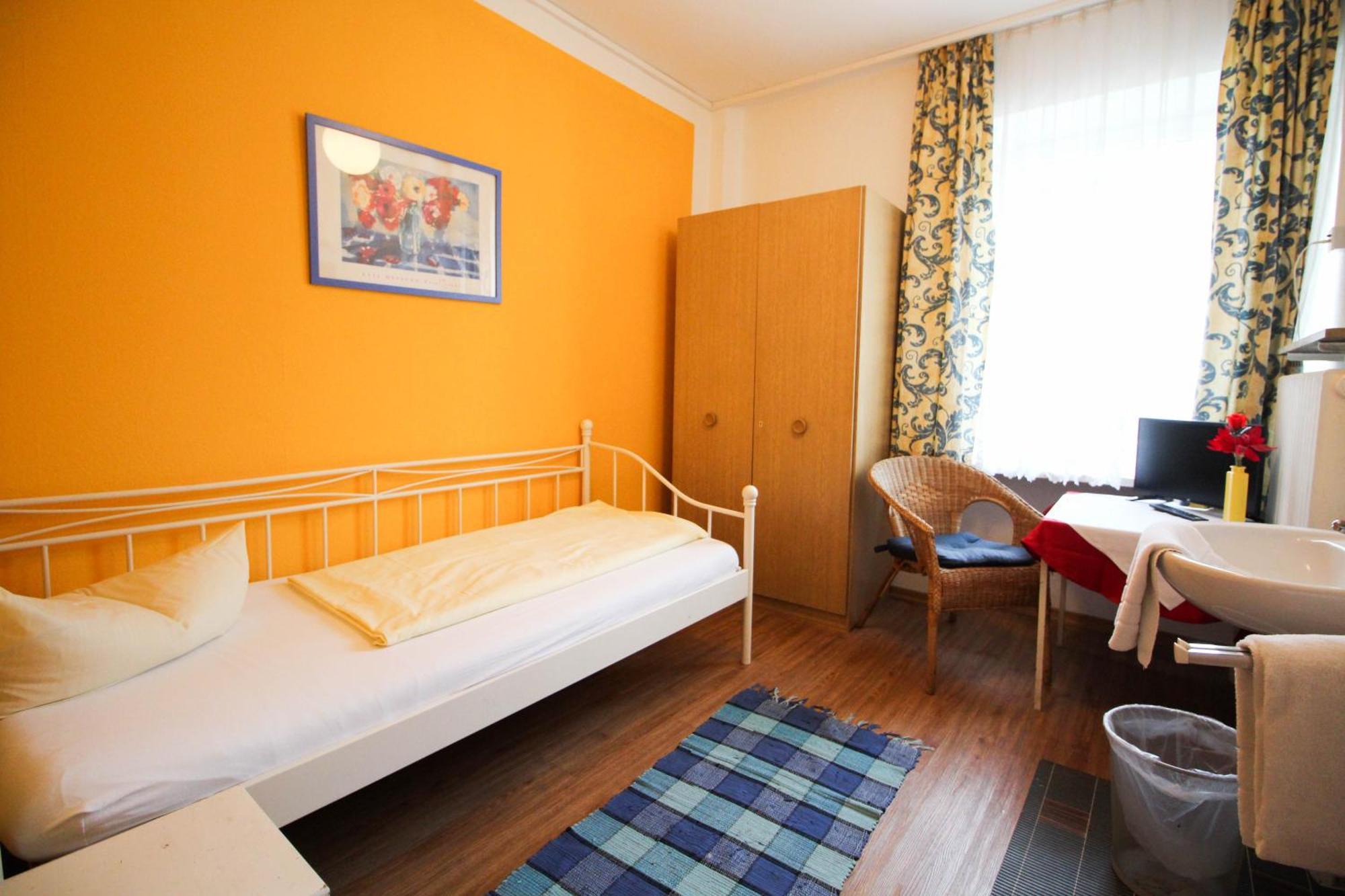 Hotel Pension Am Hauptbahnhof Munique Quarto foto